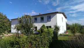 Familienfreundliche Wohnung in Vorland mit Garten